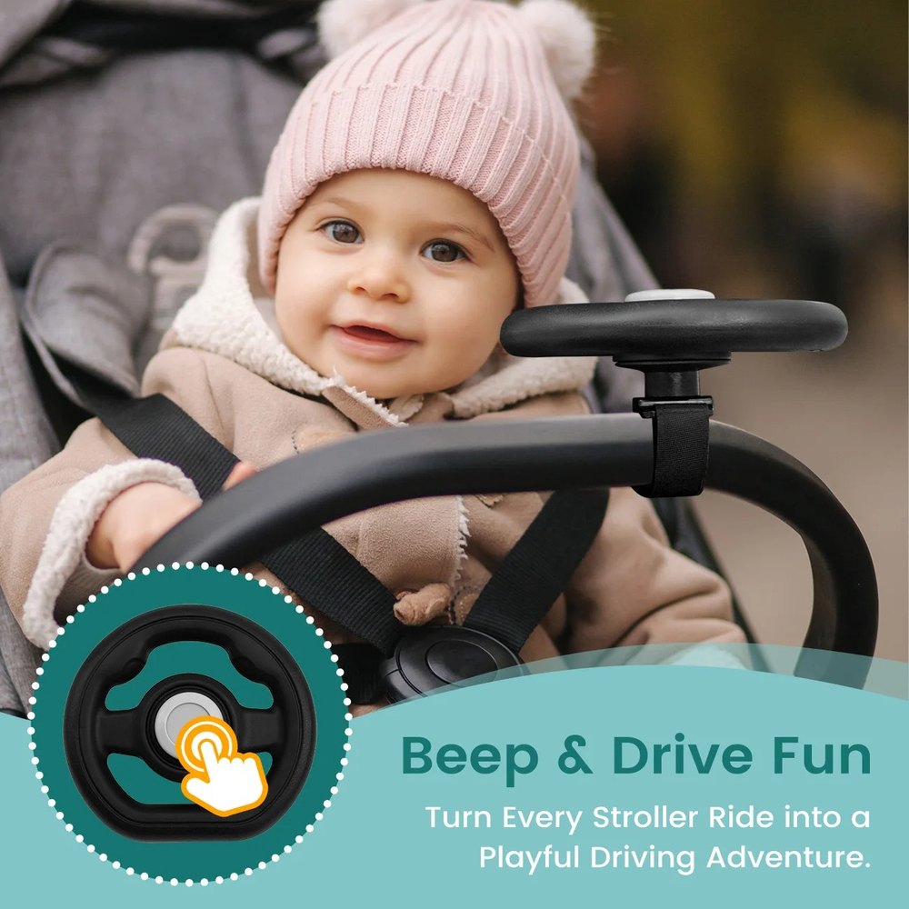 Baby in a stroller holding the EVAM BABY steering wheel, with a close-up of the sound button