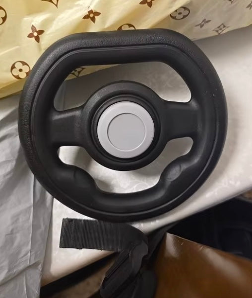Steering wheel and attachment strap